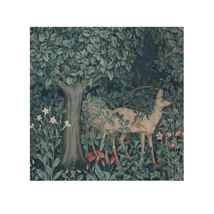 A white washcloth with a floral pattern inspired by William Morris, featuring deer and greenery.
