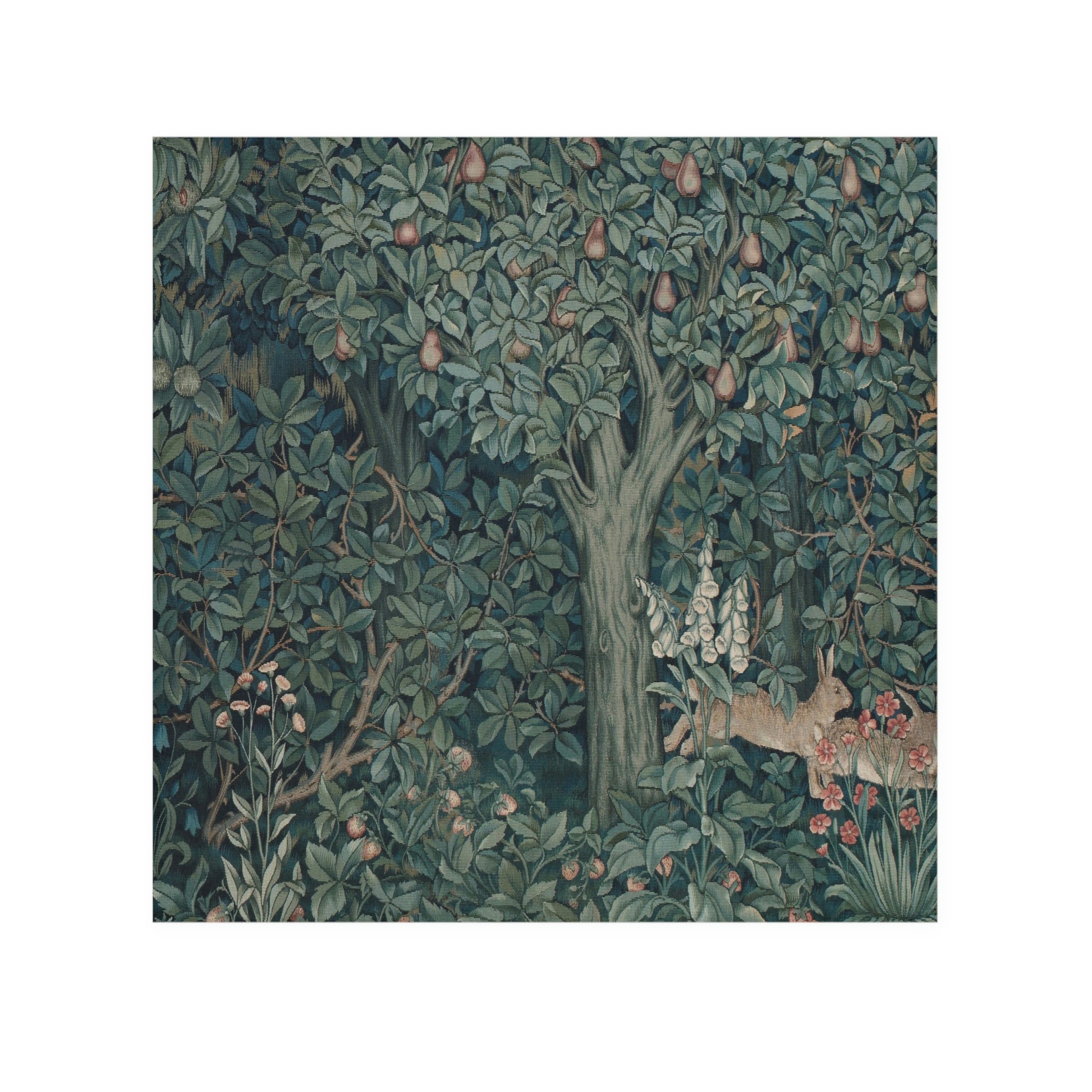 A white washcloth with a greenery design inspired by William Morris, featuring a rabbit among floral patterns.