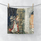 A washcloth with a floral pattern inspired by William Morris, featuring a one-sided print with a person standing at a doorway surrounded by nature.