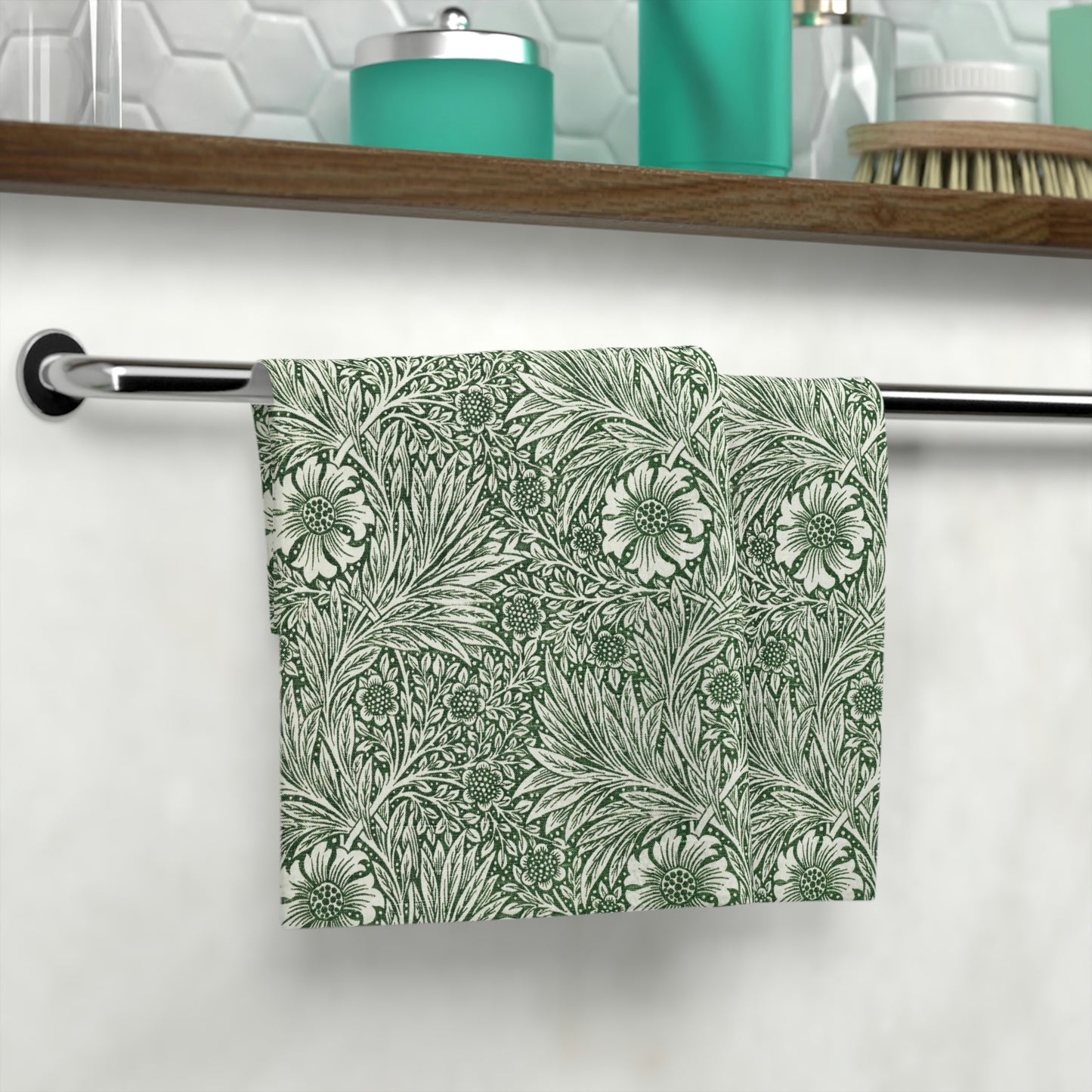 A white washcloth with a green floral pattern inspired by William Morris's art.