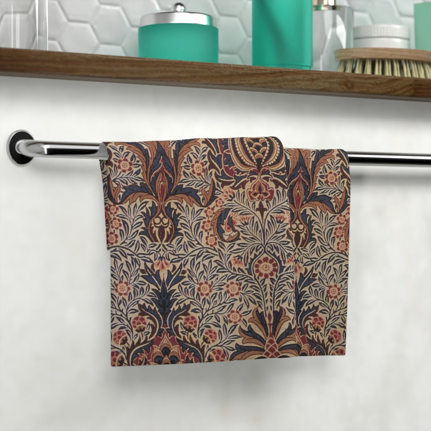 A white washcloth with a floral pattern inspired by William Morris, featuring a mix of colourful floral designs.