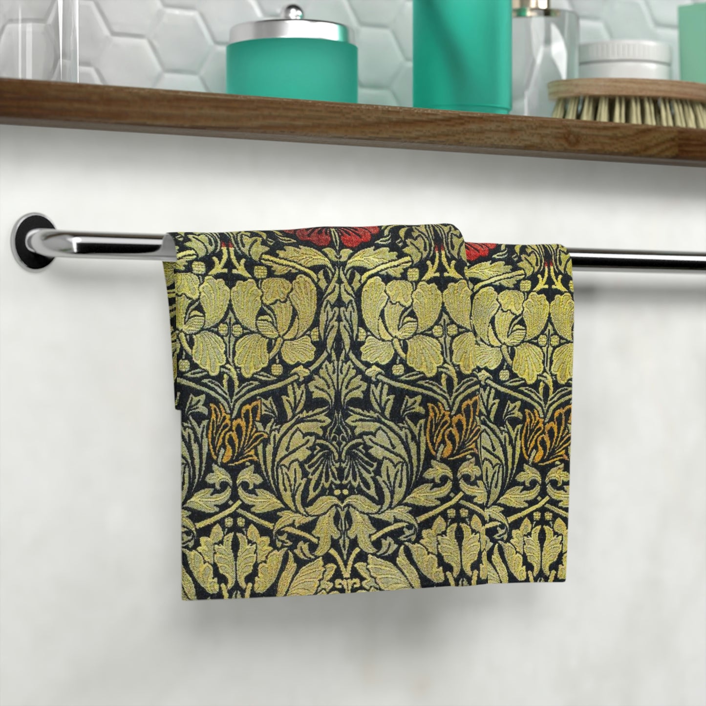 A washcloth with a floral pattern inspired by William Morris, featuring tulips and roses in red and green colors on a beige background.