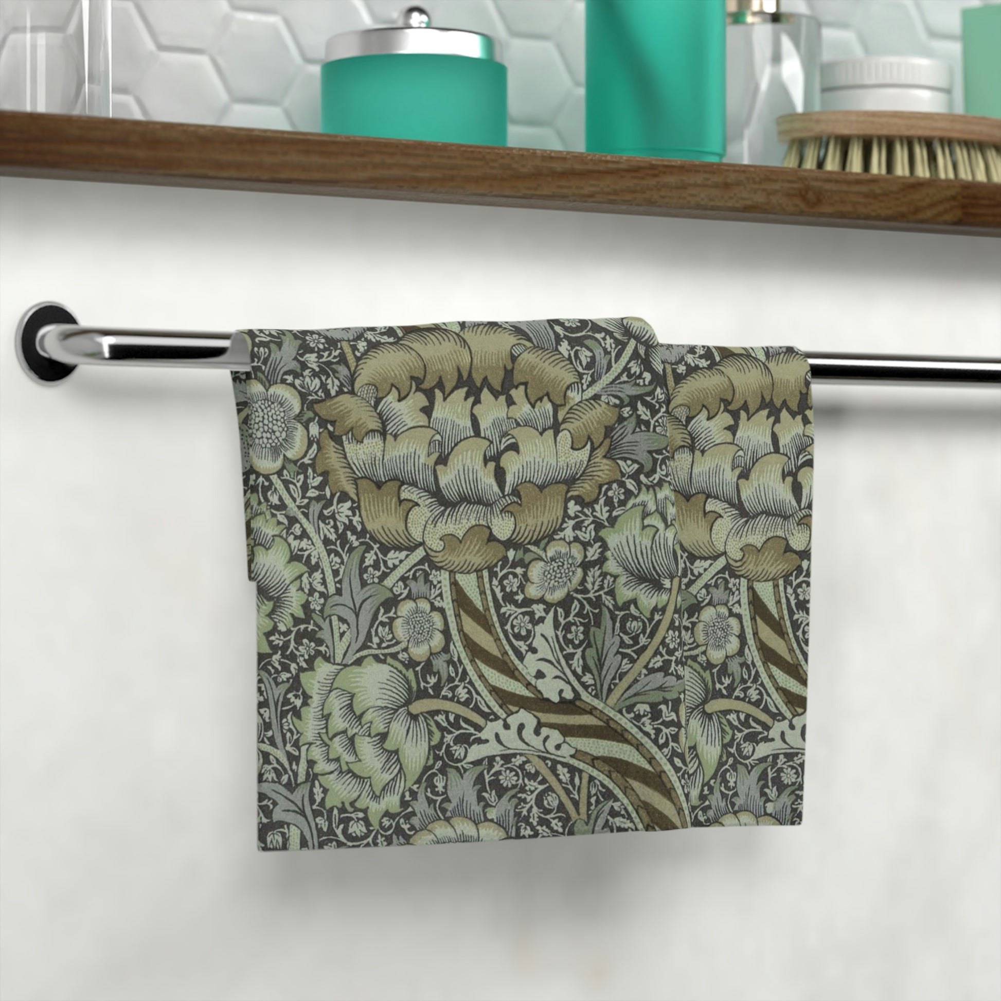 A gray and multicoloured floral patterned washcloth inspired by William Morris' Wandle Collection.
