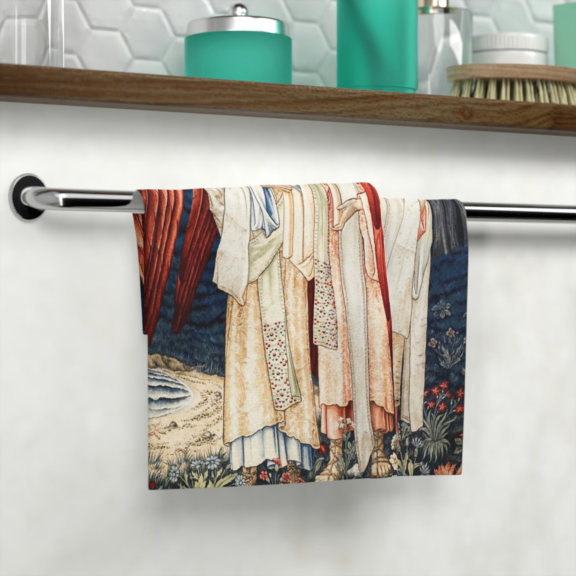 A washcloth featuring an artistic print with red angels inspired by William Morris from the Holy Grail Collection.