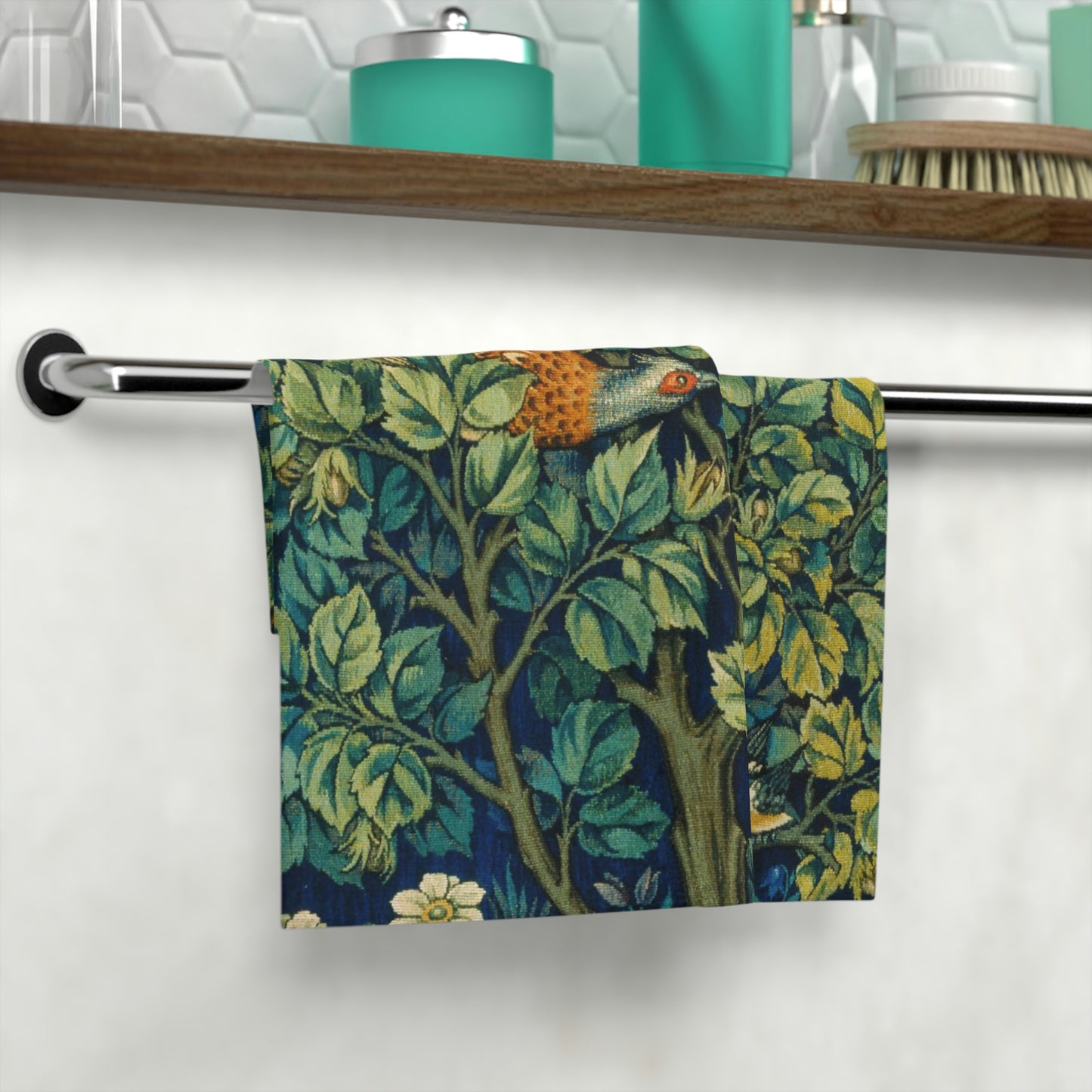 A washcloth with a floral pattern featuring a pheasant design, inspired by William Morris' art.